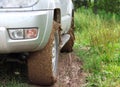 Extreme offroad behind car in mud Royalty Free Stock Photo