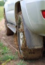 Extreme offroad behind car in mud Royalty Free Stock Photo