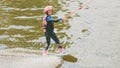 Extreme Park, Kiev, Ukraine, 07 may 2017 - a little girl to ride a Wakeboard. Photo of grain processing Royalty Free Stock Photo