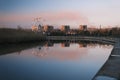 Extreme park near the river in autumn time evening, red sky beautiful sunset with red cloud Royalty Free Stock Photo