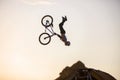 Extreme rider falling while making a bike jump. Royalty Free Stock Photo