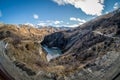 Extreme road trip journey along narrow road of Skippers Canyon, New Zealand