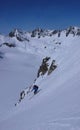 Extreme skier in a steep couloir in the Silvretta mountains