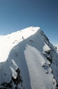 Extreme skier at the top of a couloir on Corvatsch