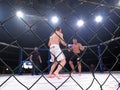 Extreme Sport mixed martial arts competition tournament MMA MAXMIX. Octagonal ring for fights. Royalty Free Stock Photo