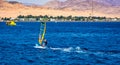 Extreme sport windsurfing in blue sea waves