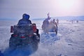 Extreme sport. Winter race on motorcycles and ATVs. Royalty Free Stock Photo