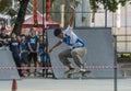 Extreme sports activity outdoor. Young skater boy rides on a skateboard