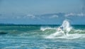 Extreme sports photography of athlete on kiteboard surfing