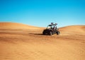 Beautiful black buggy quad bike ride at arabic sand dunes