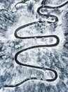 Extreme winding road in the mountains in wintertime Royalty Free Stock Photo