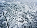 Extreme Winter Weather on a winding road in the mountains Royalty Free Stock Photo