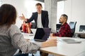 Extremely angry man head of department screaming at his workers Royalty Free Stock Photo