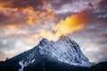 extremely burning clouds in the evening sky over the gehrenspitze with freshly snow-covered rocks Royalty Free Stock Photo