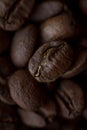 Extremely close-up background roasted coffee beans with gold streaks, good morning concept Royalty Free Stock Photo