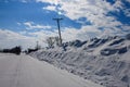 Extremely deep snowbanks pushed telephone pole crooked