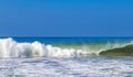 Extremely huge big surfer waves at beach Puerto Escondido Mexico Royalty Free Stock Photo