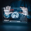 Photorealistic cropped view of gloved hands hovering over a complex 3D medical visualization on a transparent screen displaying lu Royalty Free Stock Photo