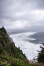 Extremely windy and cloudy day along Oregon coast cliff Royalty Free Stock Photo