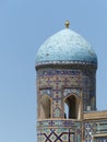 Extremity of a decotated minaret of the Sher dor Madrasah to Samarkand in Uzbekistan.