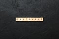 extrovert word written on wood block. extrovert text on table, concept