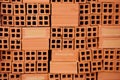 Stacks of fired red clay bricks horizontal background image