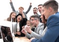 Exultant business team looking at the screen of the office computer Royalty Free Stock Photo