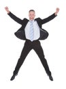 Exultant businessman cheering