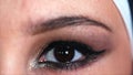 The eye of a beautiful Arab muslim woman with fashion bright makeup.