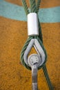 Eye bolt secures cable to the ground Royalty Free Stock Photo