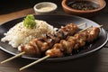 A tantalising platter of yakitori, Japanese grilled chicken skewers coated in a stick. (Generative AI) Royalty Free Stock Photo