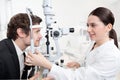 Eye Doctor With a Woman Patient Having an Exam