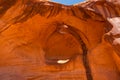 Eye of the eagle Big Hogan. Pothole natural arch eroded in sandstone.