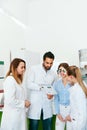 Eye Exam. Doctors Checking Woman Eyesight With Optometry Glasses