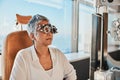 Eye exam, frame and senior woman at optometrist for vision test, trial eyeglasses and optical assessment. Ophthalmology Royalty Free Stock Photo