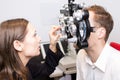 Eye exam at optician Royalty Free Stock Photo
