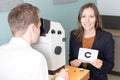 Eye exam at optician Royalty Free Stock Photo