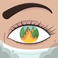 Female eye with forest fire in a close up view. Royalty Free Stock Photo