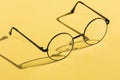 Eye glasses isolated on yellow background Royalty Free Stock Photo