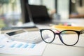 eye glasses placed on the desk are eye glasses that are prepared for people with farsightedness to work and read documents clearly Royalty Free Stock Photo