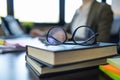 eye glasses placed on the desk are eye glasses that are prepared for people with farsightedness to work and read documents clearly Royalty Free Stock Photo