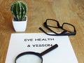 Eye health and vision note written on a white paper.