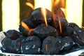 Eye level Flaming BBQ briquettes Royalty Free Stock Photo