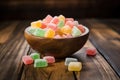 eye-level shot of a bowl of sugar-free candy on a wooden table Royalty Free Stock Photo