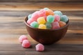 eye-level shot of a bowl of sugar-free candy on a wooden table Royalty Free Stock Photo