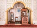 Eye level view of the mihrab or a special room that juts forward, as a place for the imam to lead prayers in the mosque