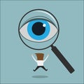 Eye looking through a magnifying glass finding man Royalty Free Stock Photo