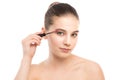 Eye make up apply. Mascara applying closeup, long lashes. makeup brush. Isolated. Royalty Free Stock Photo