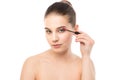 Eye make up apply. Mascara applying closeup, long lashes. makeup brush. Isolated. Royalty Free Stock Photo