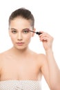 Eye make up apply. Mascara applying closeup, long lashes. makeup brush. Isolated. Royalty Free Stock Photo